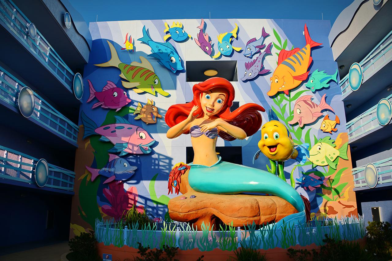 Ariel mural with sea turtle and fish at Disney resort underwater scene